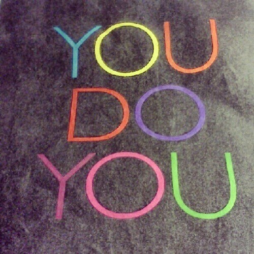 A neon sign reading: "You do you"